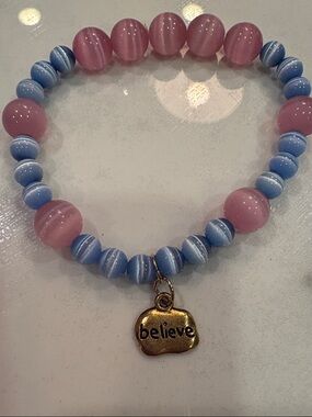 OKO designs cats eye glass believe stretch bracelet